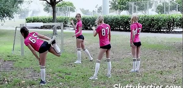  Entire girls football team plays with balls